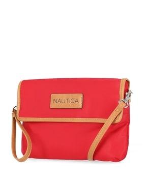 women sling bag with logo patch