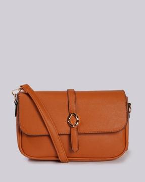 women sling bag with metal accent