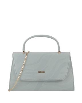 women sling bag with metal accent