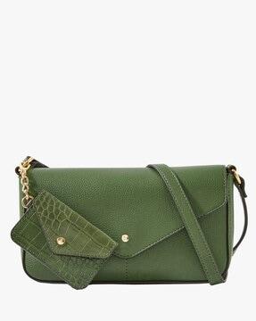 women sling bag with snap-button closure