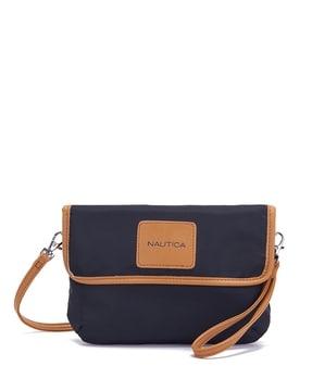 women sling bag with snap-button closure