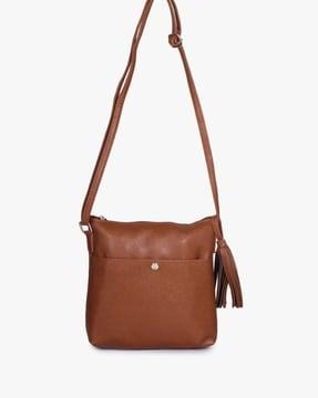 women slingbag with tassel accent