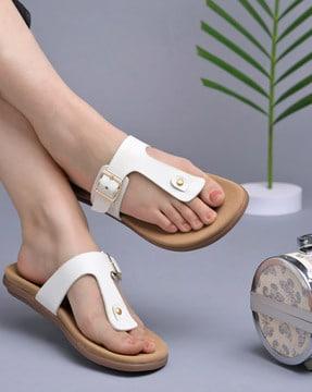 women slip-on flat sandals with metal accent