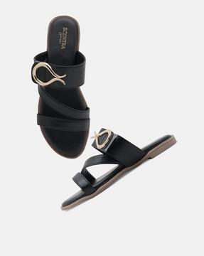 women slip-on flat sandals with metal accents