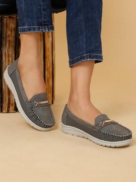 women slip-on moccasins with metal accent