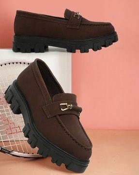 women slip-on moccasins with metal accent