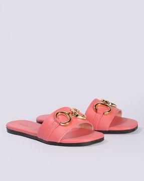 women slip-on sandals with metal accent