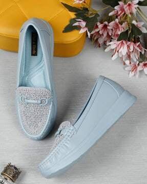 women slip-on shoes with metal accent