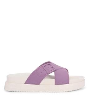 women slip-on slide with buckle fastening