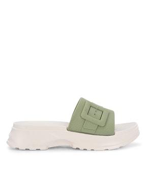 women slip-on slide with buckle fastening