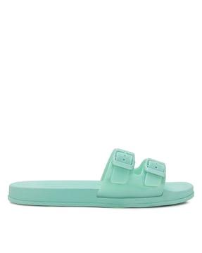 women slip-on slides with buckle accent