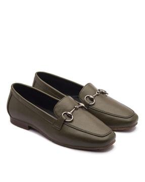 women slip-ons with metal accent