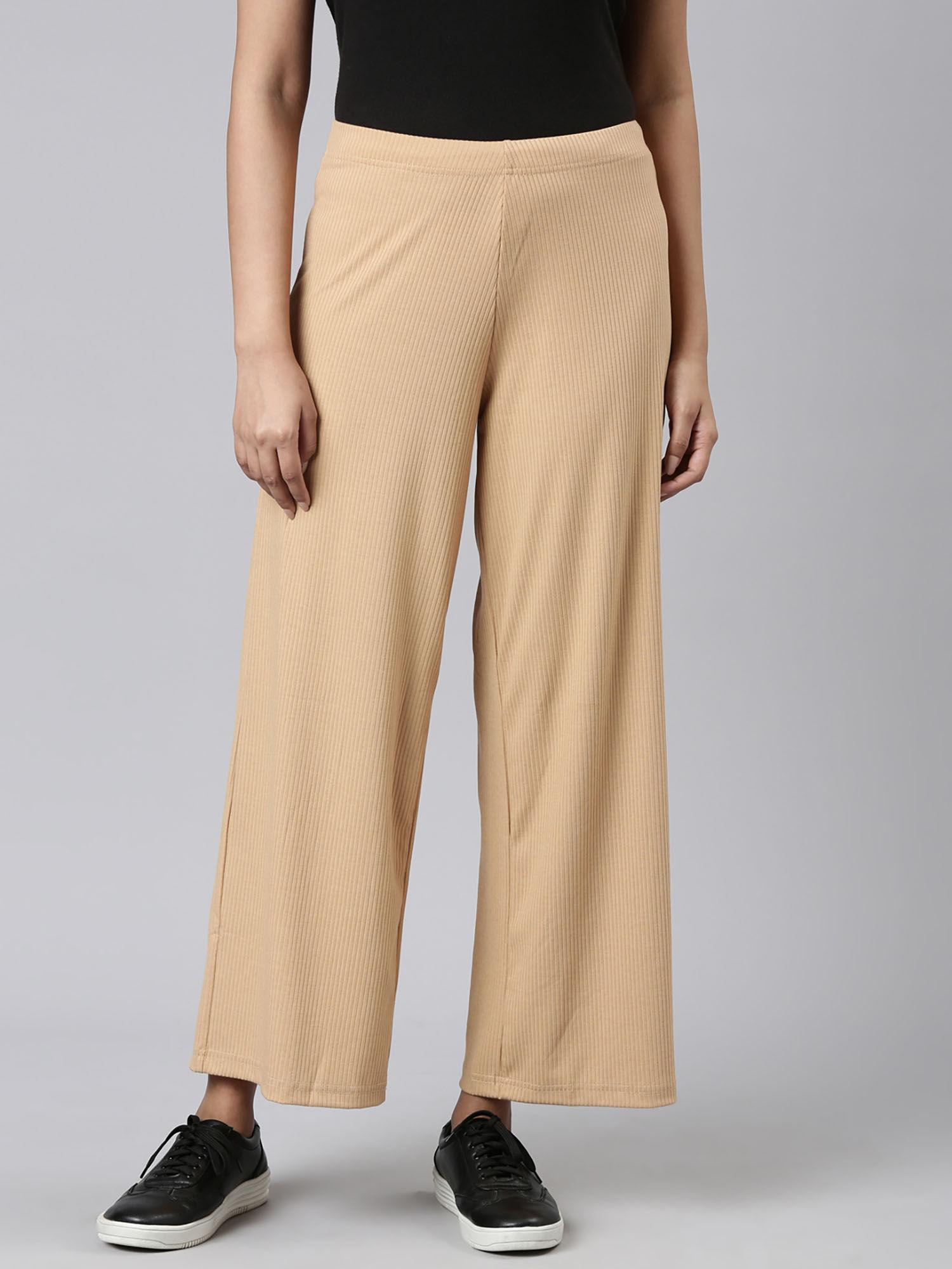 women solid beige ribbed palazzos
