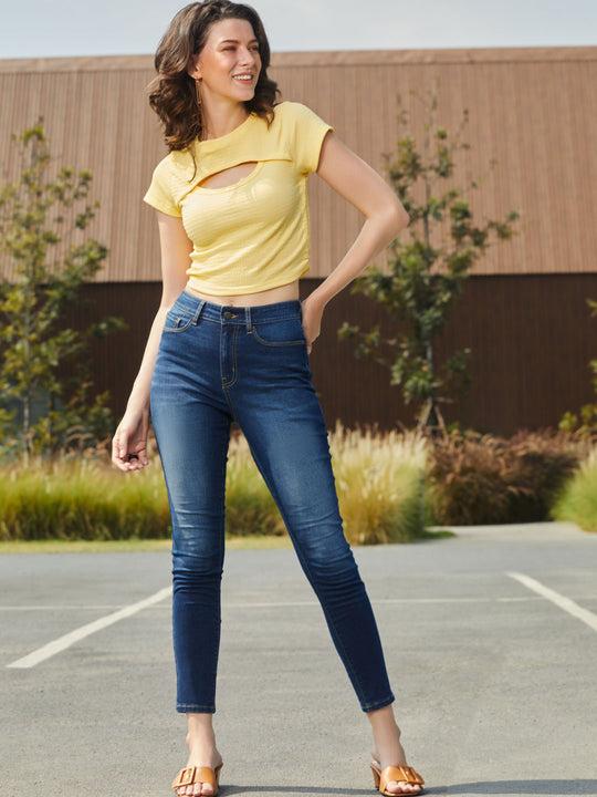 women solid blue mid rise skinny jeans