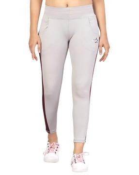 women solid fitted track pants