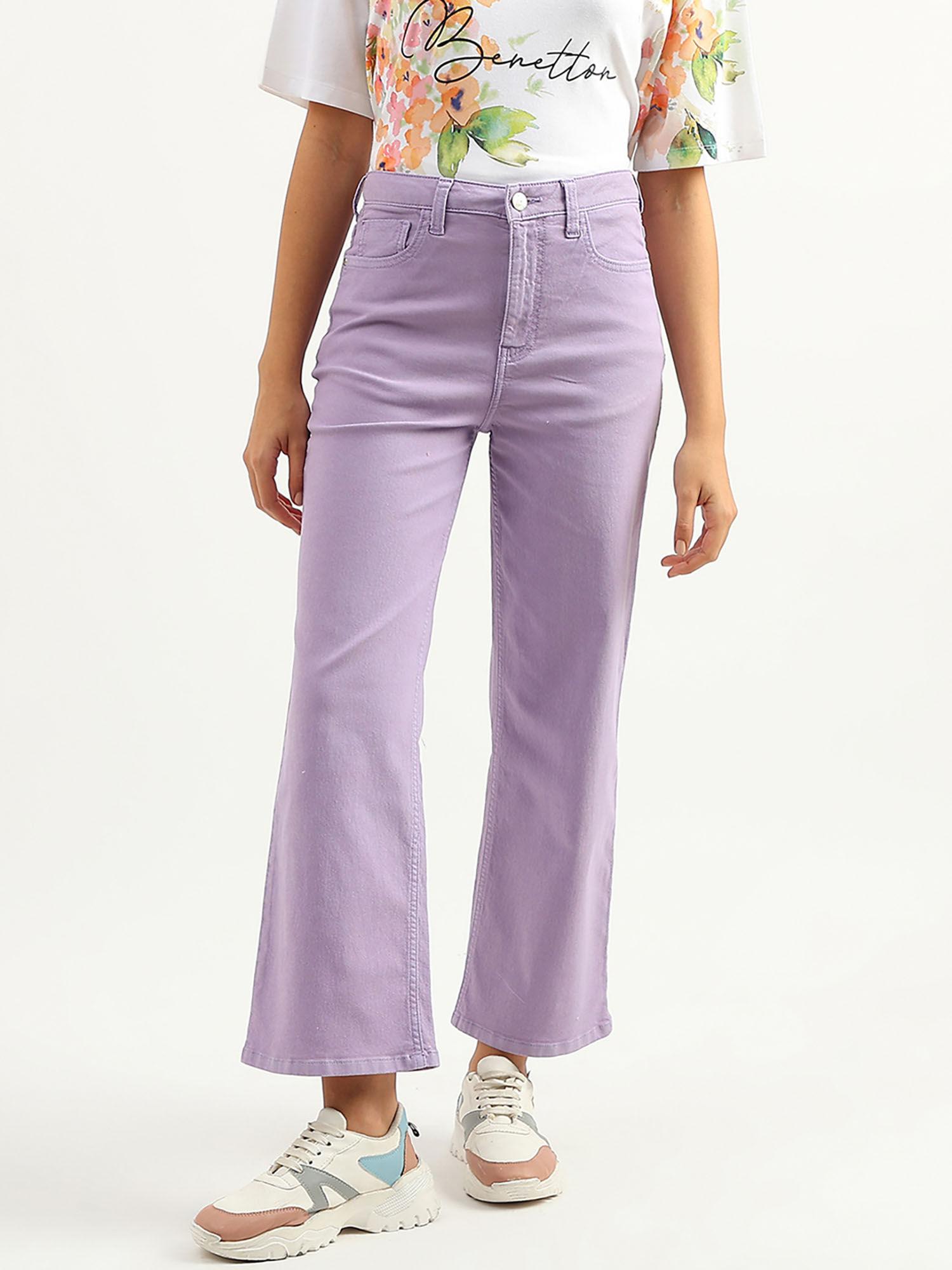 women solid flared fit purple jeans