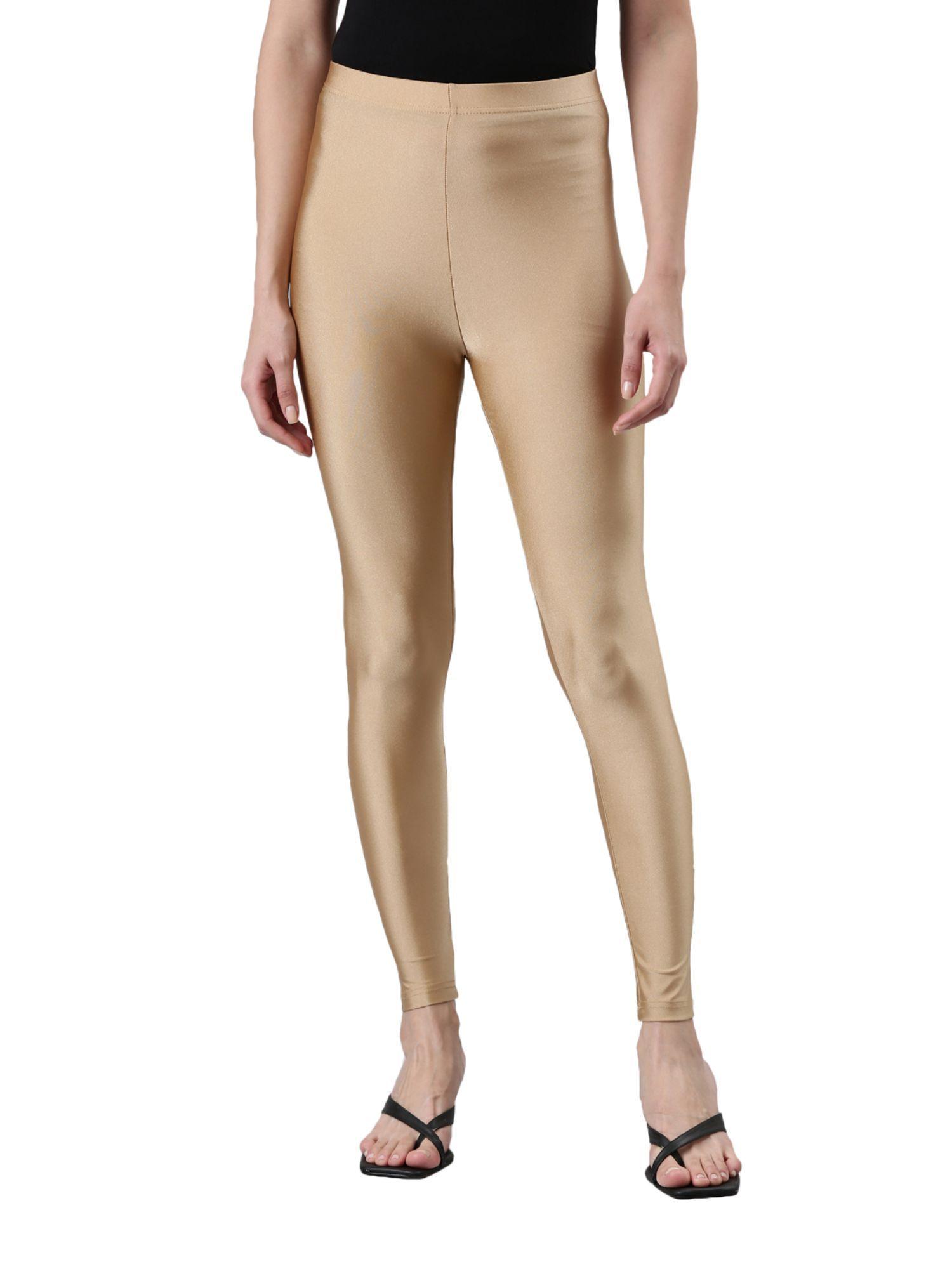 women solid gold shimmer leggings