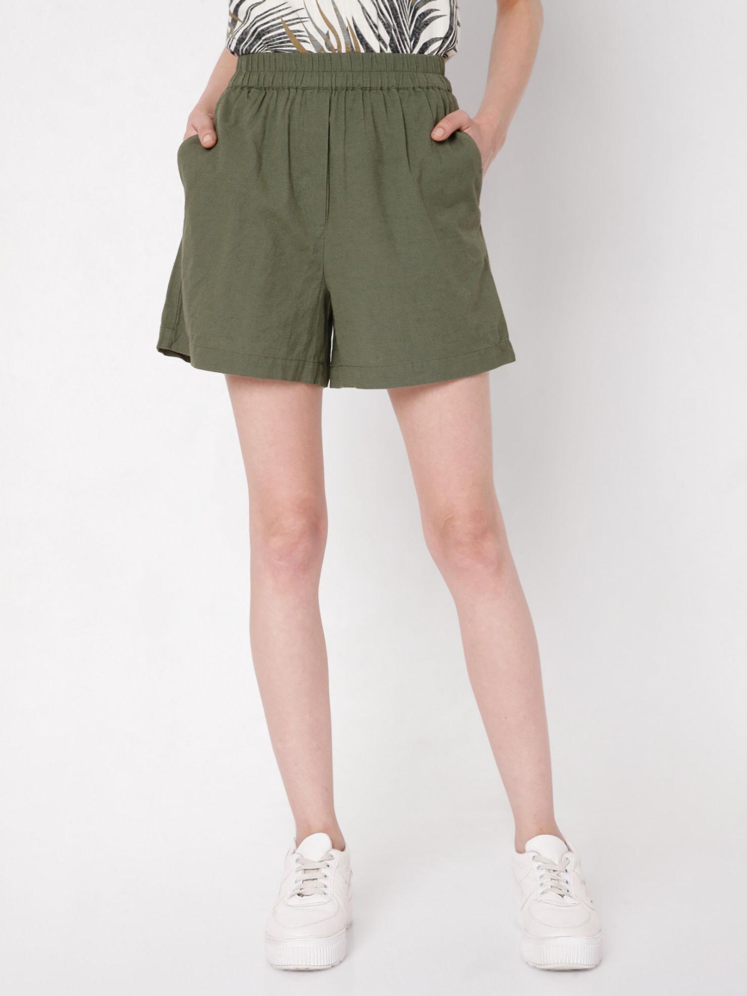 women solid green shorts