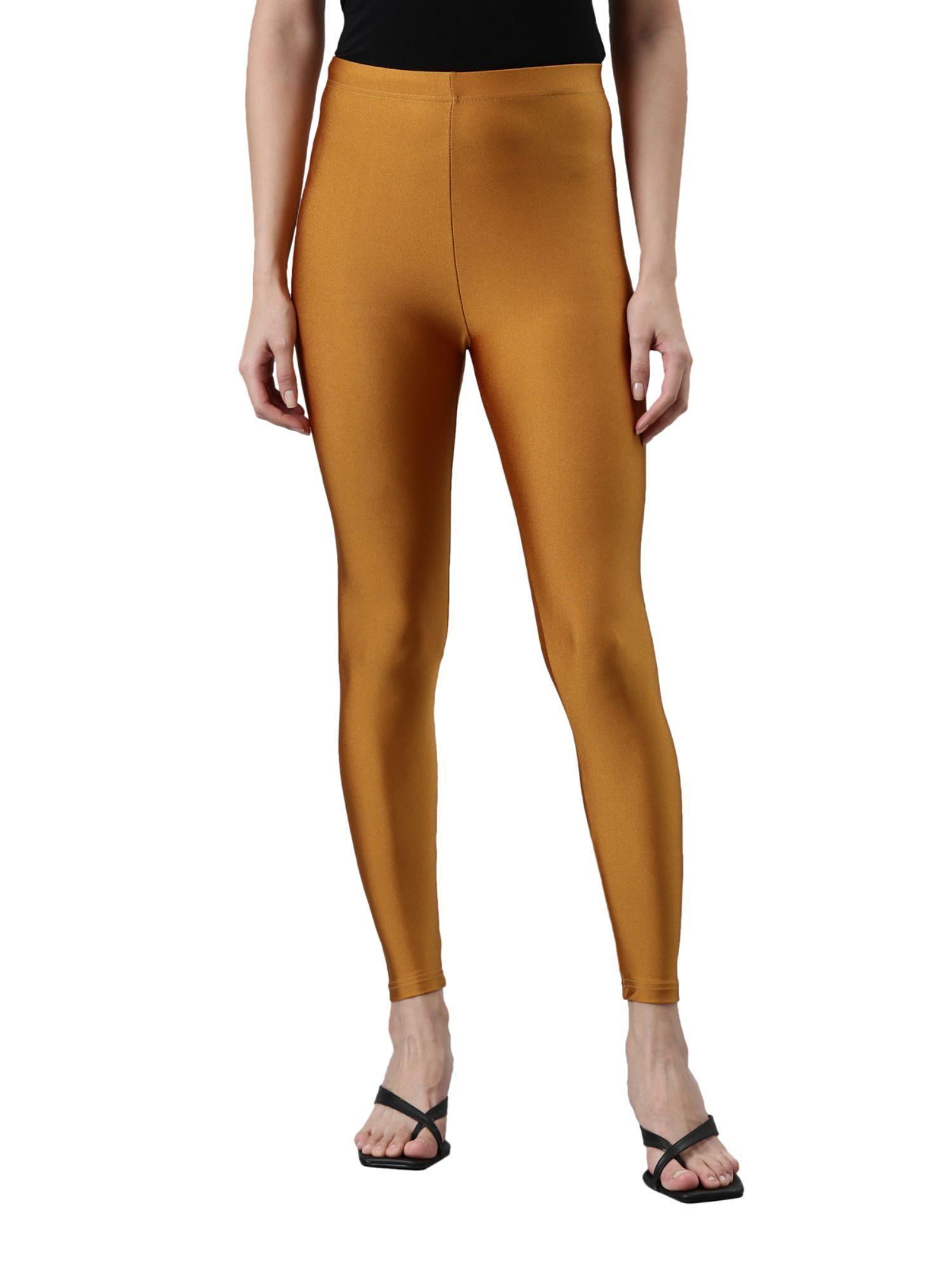 women solid mustard slim fit shimmer leggings