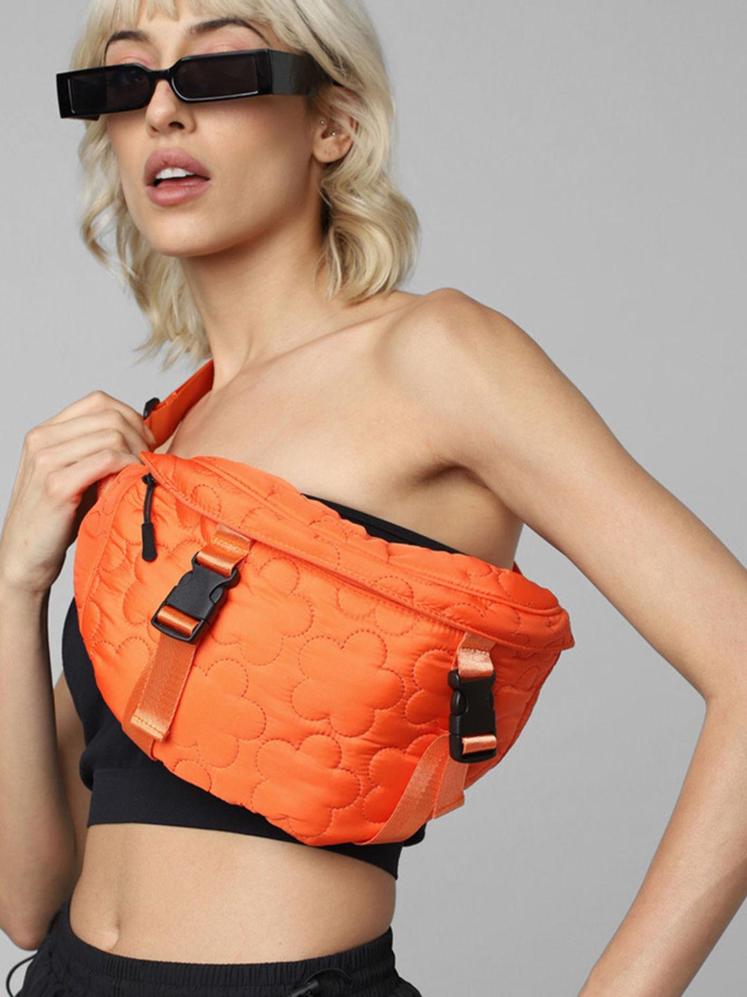 women solid orange bag