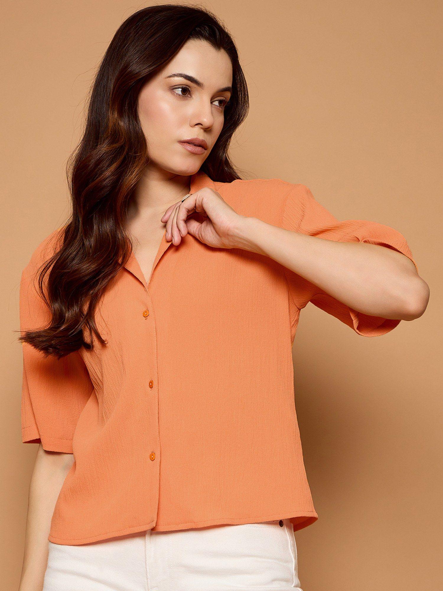 women solid oversized orange casual shirt