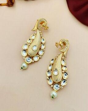 women stone-studded dangler earrings