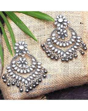 women stone-studded drop earrings