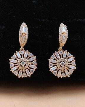 women stone-studded drop earrings