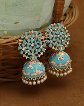 women stone-studded jhumka earrings