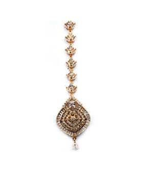 women stone-studded mang tikka