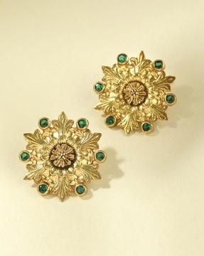 women stone-studded studs earrings