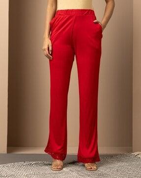 women straight fit palazzos with embroidered hem