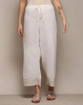 women straight fit palazzos with embroidered hem