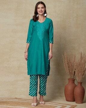 women straight kurta set with embroidery