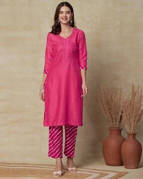 women straight kurta set with embroidery