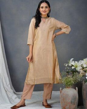 women straight kurta set with embroidery