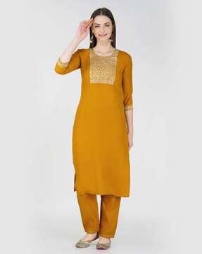 women straight kurta set with embroidery