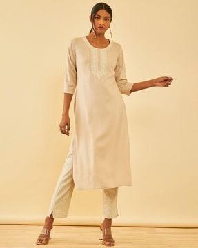 women straight kurta with embroidered yoke