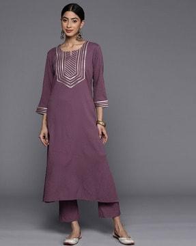 women straight kurta with embroidery yoke