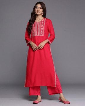 women straight kurta with embroidery yoke