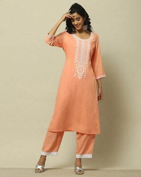 women straight kurta with embroidery yoke