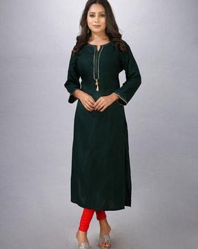 women straight kurta with tassel