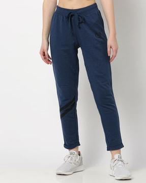 women strap track pants with roll-up hems