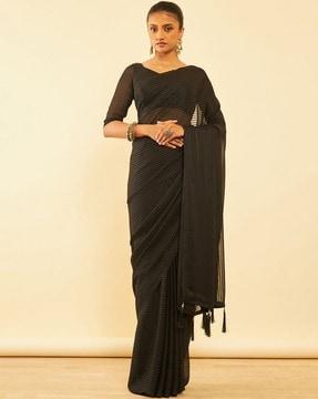 women striped chiffon saree with tassels