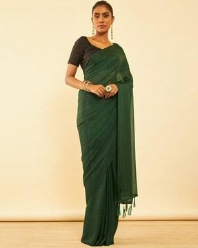 women striped chiffon saree with tassels