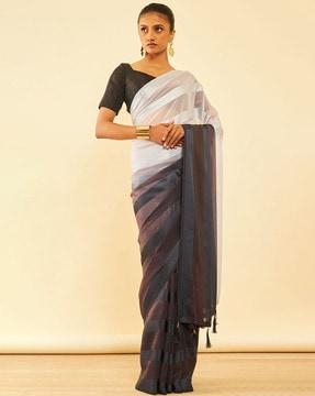 women striped chiffon saree with tassels