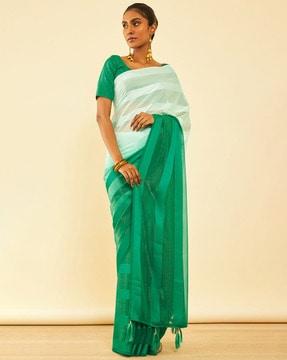 women striped chiffon saree with tassels