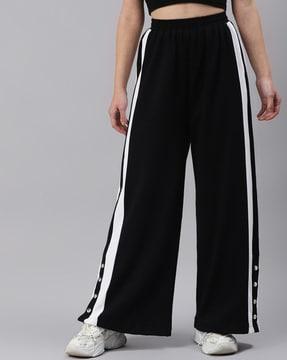 women striped flared trackpants