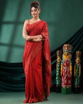 women striped handloom saree with tassels