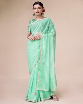 women striped jacquard saree with patch border